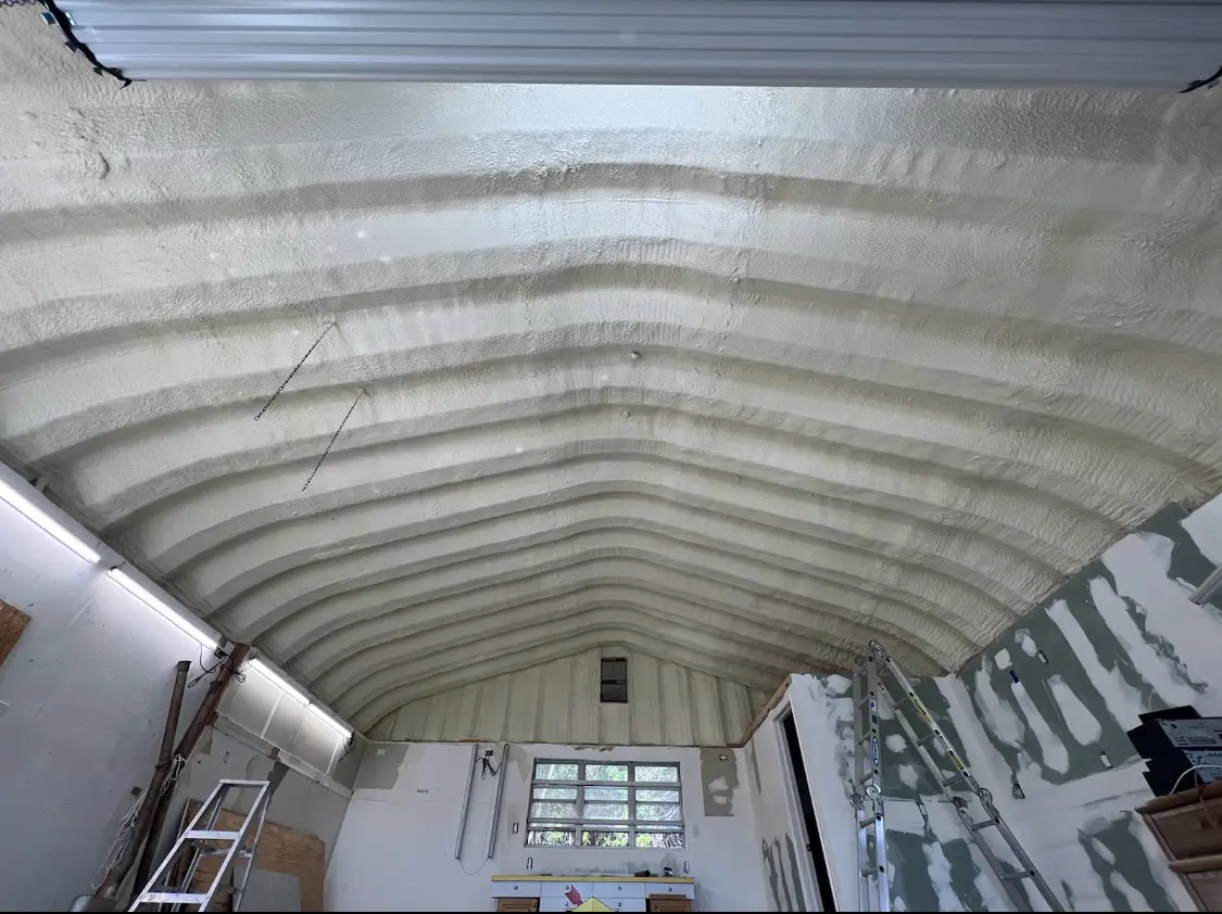 Spray polyurethane foam applied to the underside of a metal roof deck in Port Isabel